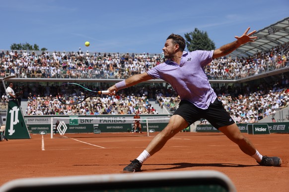 Switzerland&#039;s Stan Wawrinka plays a shot against Australia&#039;s Thanasi Kokkinakis during their second round match of the French Open tennis tournament at the Roland Garros stadium in Paris, We ...