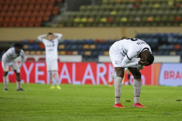 Xamax&#039;s forward Louis Mafouta, right, reacts after missing a goal, during the Challenge League soccer match of Swiss Championship between FC Stade-Lausanne-Ouchy and Neuchatel Xamax FCS, at the S ...