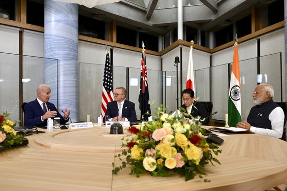 U.S. President Joe Biden, left, Prime Minister Anthony Albanese, second left, of Australia, Prime Minister Fumio Kishida, third left, of Japan and Prime Minister Narendra Modi of India, attend a Quad  ...