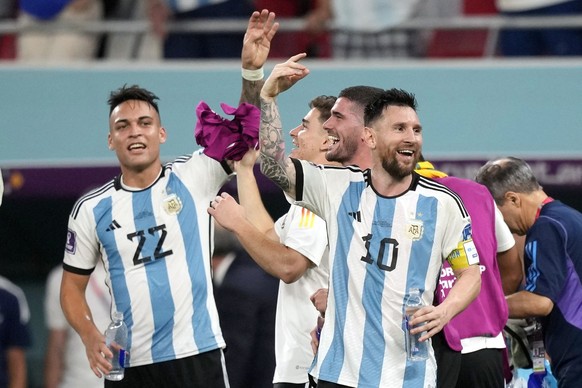 Argentina&#039;s Lionel Messi and his teammates celebrate after the World Cup round of 16 soccer match between Argentina and Australia at the Ahmad Bin Ali Stadium in Doha, Qatar, Saturday, Dec. 3, 20 ...