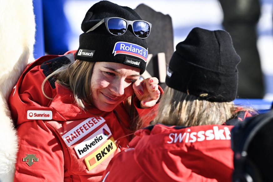 epa10460392 Jasmine Flury (L) of Switzerland and Corinne Suter of Switzerland react in the finish area during the Women&#039;s Downhill race at the FIS Alpine Skiing World Championships in Meribel, Fr ...