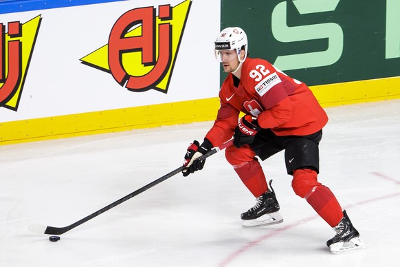 Switzerland&#039;s forward Gaetan Haas controls the puck, during the IIHF 2023 World Championship preliminary round group B game between Switzerland and Slovakia, at the Riga Arena, in Riga, Latvia, T ...