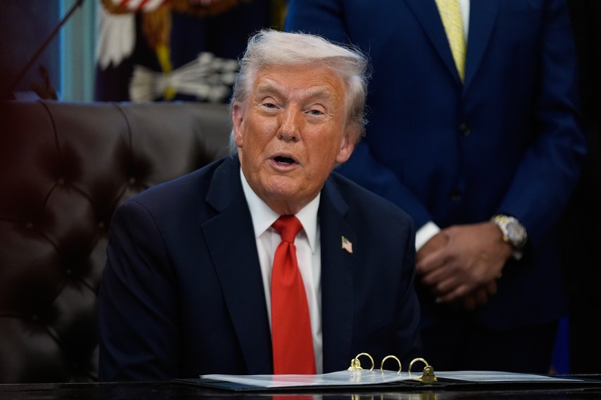 President Donald Trump answers questions from reporters during a Diwali celebration in the Oval Office at the White House, Tuesday, Oct. 21, 2025, in Washington. (AP Photo/Manuel Balce Ceneta)
Donald  ...