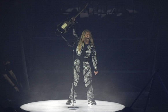 Sam Ryder from United Kingdom singing Space Man performs during the Grand Final of the Eurovision Song Contest at Palaolimpico arena, in Turin, Italy, Saturday, May 14, 2022. (AP Photo/Luca Bruno)