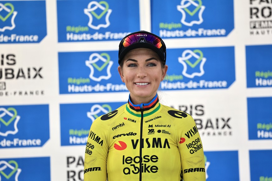 epa12885453 Third placed French rider Pauline Ferrand-Prevot of team Team Visma Lease a Bike celebrates on the podium after the Paris-Roubaix Femmes over 143.1km from Denain to Roubaix, France, 12 Apr ...