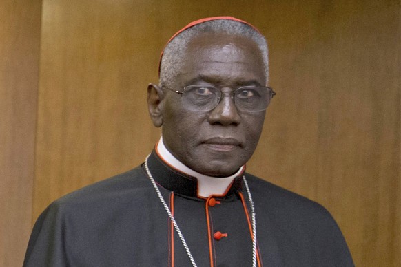 FILE - Cardinal Robert Sarah appears for the presentation of Cardinal Raymond Leo Burke&#039;s book Divine Love Made Flesh, in Rome, on Oct. 14, 2015. (AP Photo/Andrew Medichini, File)
Vatican Obit Po ...