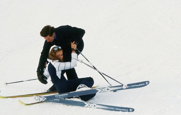 SWITZERLAND - JANUARY 01: Girl collides with Prince Charles, Prince of Wales on the ski slopes in Klosters during his annual skiing holiday (Photo by Tim Graham Photo Library via Getty Images)