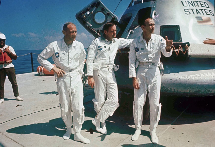 FILE - In this 1969 file photo, Apollo 11 astronauts from left, Col. Edwin &quot;Buzz&quot; Aldrin, lunar module pilot; Neil Armstrong, flight commander; and Lt. Michael Collins, command module pilot, ...