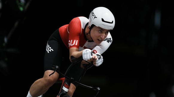 Marlen Reusser of Switzerland competes during the women&#039;s cycling individual time trial at the 2020 Summer Olympics, Wednesday, July 28, 2021, in Oyama, Japan. (AP Photo/Thibault Camus)