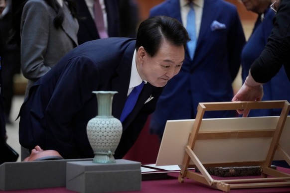 LONDON, ENGLAND - NOVEMBER 21: King Charles III with Queen Camilla shows The President of Korea Yoon Suk Yeol and First Lady, Kim Keon Hee a display of Korean items from the Royal Collection, inside B ...