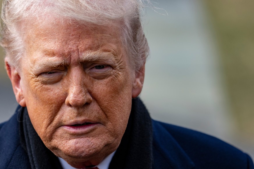 President Donald Trump speaks with reporters before departing on Marine One from the South Lawn of the White House, Friday, Jan. 16, 2026, in Washington. (AP Photo/Alex Brandon)
Donald Trump