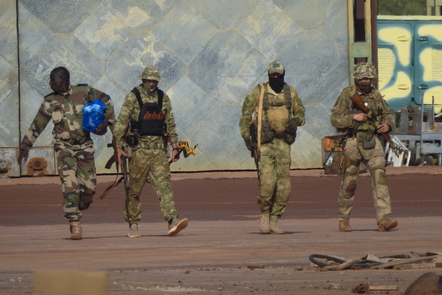 FILE - This undated photograph handed out by French military shows three Russian mercenaries, right, in northern Mali. Russia&#039;s Wagner Group, a private military company led by Yevgeny Prigozhin,  ...