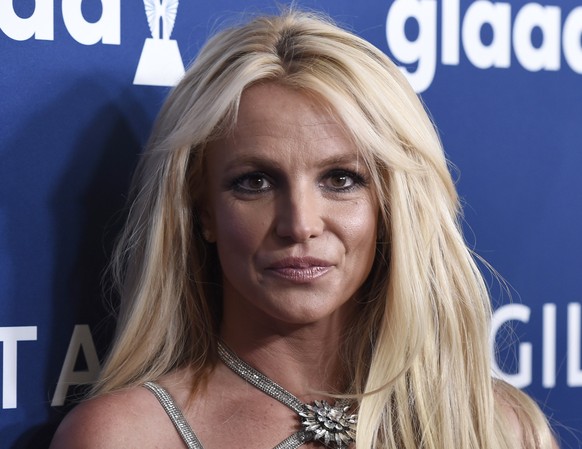 FILE - In this April 12, 2018 file photo Britney Spears arrives at the 29th annual GLAAD Media Awards, in Beverly Hills, Calif. Spears&#039; fight to end the conservatorship that controlled vast aspec ...