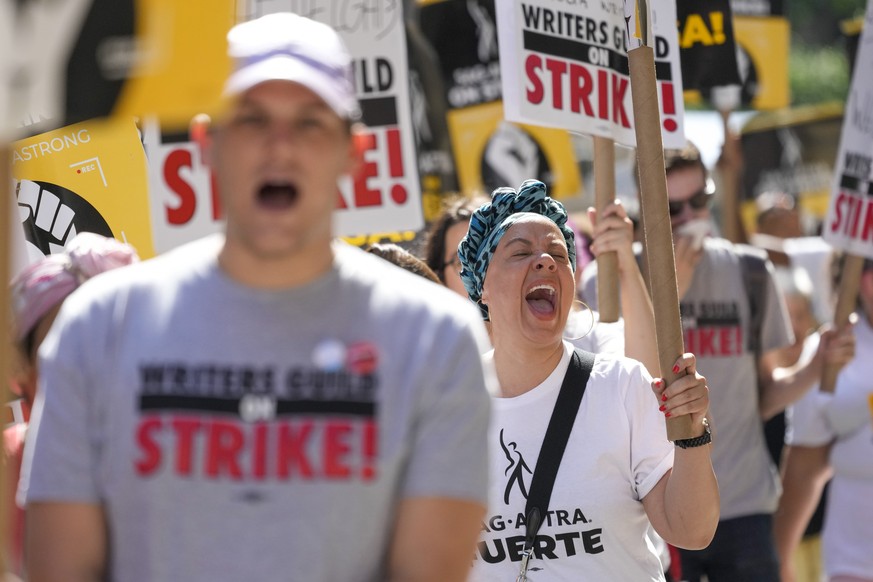 Strikers form a picket line outside Warner Bros., Discovery, and Netflix offices in New York on Friday, Aug. 18, 2023. The WGA and SAG-AFTRA held a joint Latine Picket, presented by the WGAE Latine Wr ...