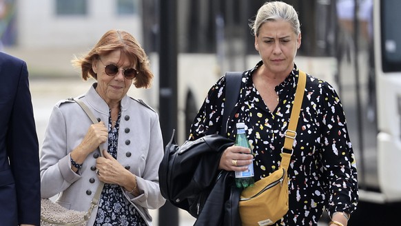 epa11609593 Gisele Pelicot (L) and her daughter Caroline Darian walk towards the criminal court during the trial of Gisele Pelicot's ex-husband in Avignon, southern France, 17 September 2024. Gis ...
