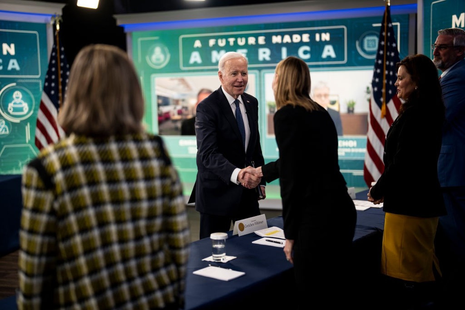 WASHINGTON, DC - MARCH 09: President Joe Biden greets Michigan Governor Gretchen Whitmer, as he meets with business leaders and bipartisan Governors at the White House on March 09, 2022 in Washington, ...