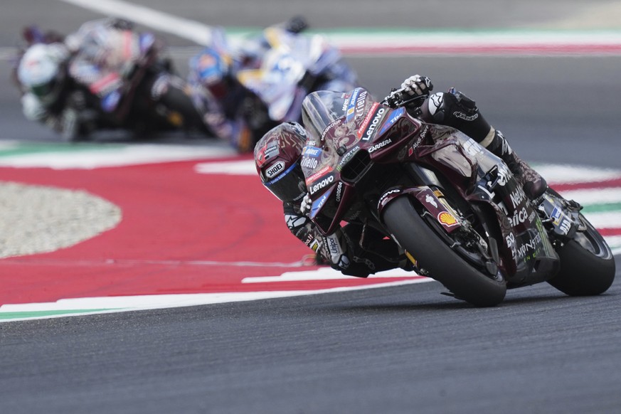 Spain&#039;s rider Marc Marquez of the Ducati Lenovo Team steers his motorcycle during the MotoGP race of the Grand Prix of Italy at the Mugello circuit in Scarperia, Italy, Sunday, June 22, 2025. (AP ...