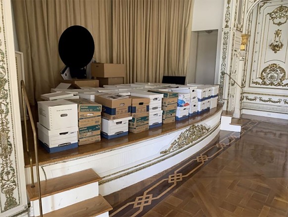 PALM BEACH, FLORIDA - UNSPECIFIED: In this handout photo provided by the U.S. Department of Justice, stacks of boxes can be observed in the White and Gold Ballroom of former U.S. President Donald Trum ...