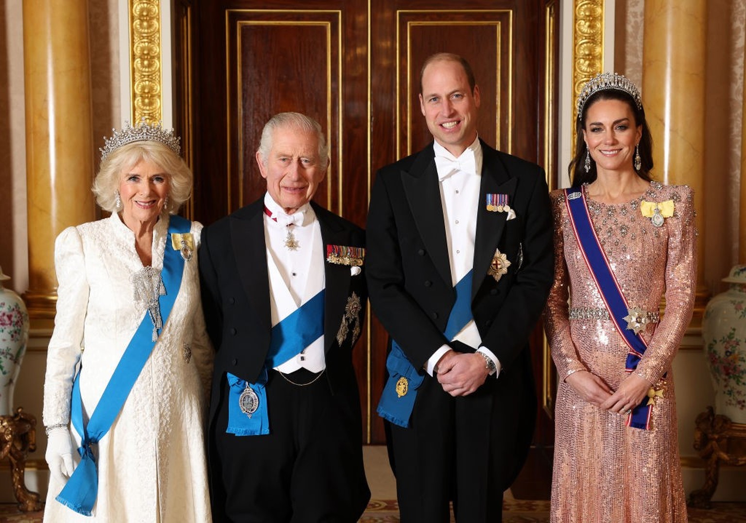 LONDON, ENGLAND - DECEMBER 05: (EDITORIAL USE ONLY) (L-R) Queen Camilla, King Charles III, Prince William, Prince of Wales and Catherine, Princess of Wales pose for a photograph ahead of The Diplomati ...