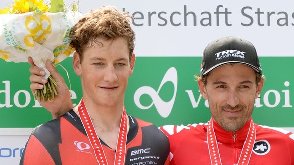 Fabian Cancellara, Mitte, wird Schweizermeister im Zeitfahren vor Stefan Kueng, links, und Silvan Dillier, rechts, beim Zeitfahren der Maenner an den Rad Schweizermeisterschaften in Roggliswil LU, am  ...