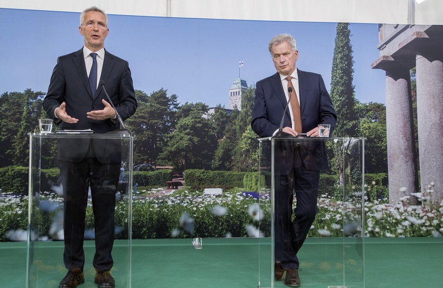 epa10009612 Finland President Sauli Niinisto (R) and Nato Secretary General Jens Stoltenberg (L) during a press conference at The Kultaranta Talks in Naantali Finland, Finland, 12 June 2022. The Kulta ...