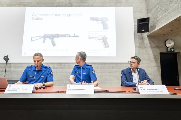Head of the Aargau Stationed Police Division Matthias Schildknecht, Aargau Canton Police Commander, Michael Leupold and Senior Public Prosecutor Lenzburg-Aargau Christoph Ruedi, left to right, attend  ...
