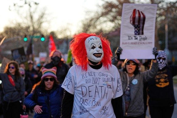 Protesters march during a rally for Renee Good, who was fatally shot by an ICE officer in Minneapolis, Saturday, Jan. 10, 2026, in Kansas City, Mo. (AP Photo/Charlie Riedel)
Immigration Enforcement Pr ...