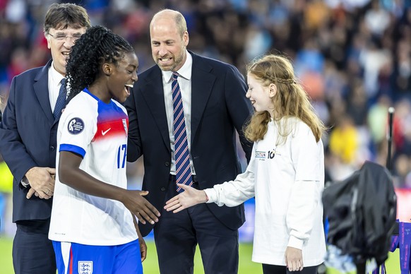 epa12266989 Britain&#039;s Prince William (C), the Prince of Wales, congratulates the tournament&#039;s best young player England&#039;s Michelle Agyemang (L) after the UEFA Women&#039;s EURO 2025 fin ...