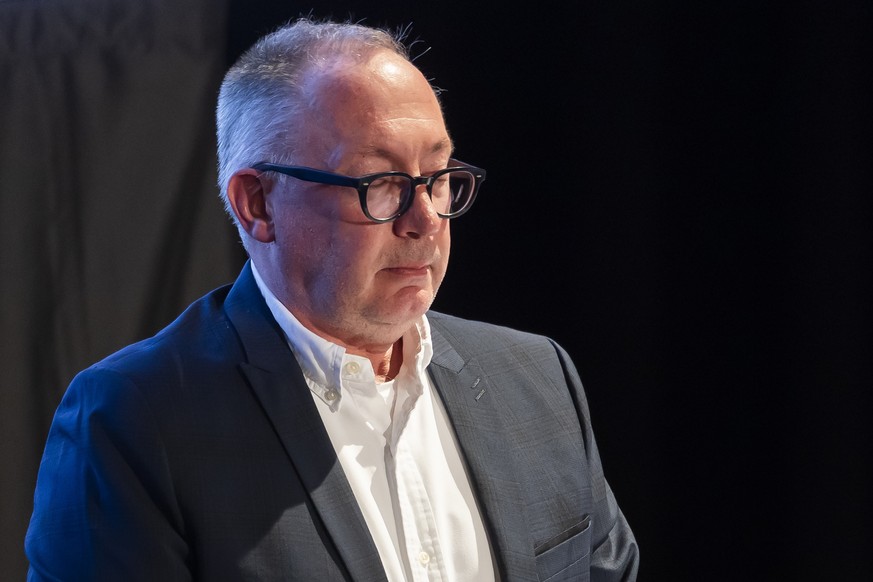 epa13042215 Nicolas Feraud, mayor of Crans-Montana, observes a minute of silence during a primary assembly in Crans-Montana, Switzerland, 16 June 2026, over the deadly fire at Le Constellation. Forty- ...
