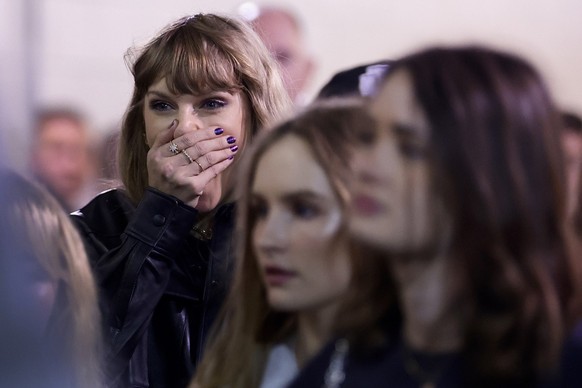 Taylor Swift reacts as she leaves Met Life Stadium after watching an NFL football game between the New York Jets and the Kansas City Chiefs, Monday, Oct. 2, 2023, in East Rutherford, N.J. (AP Photo/Ad ...