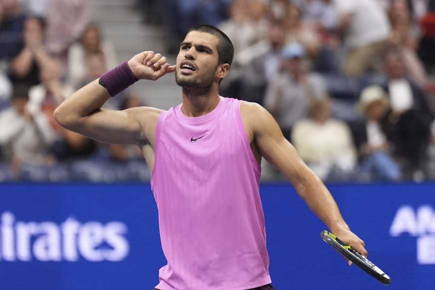 Carlos Alcaraz, of Spain, reacts during the men&#039;s singles final of the U.S. Open tennis championships against Jannik Sinner, of Italy, Sunday, Sept. 7, 2025, in New York. (AP Photo/Frank Franklin ...