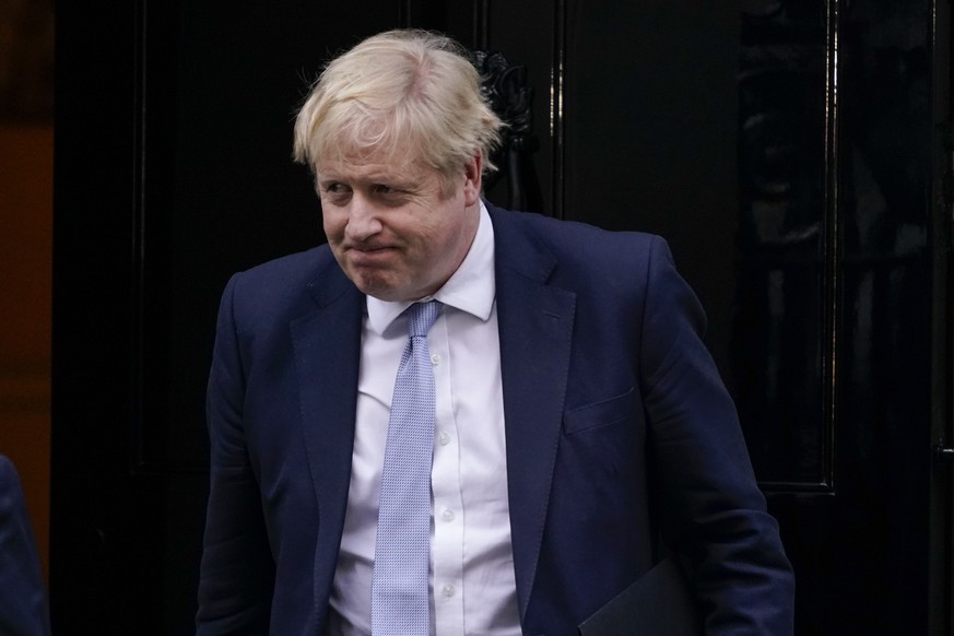 Britain&#039;s Prime Minister Boris Johnson leaves 10 Downing Street as he makes his way to the House of Commons, in London, Monday, Jan. 31, 2022. An investigation says lockdown-breaching parties by  ...