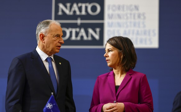 epa09948172 Annalena Baerbock (L), Foreign Minister of Germany, and Mircea Geoana, Nato&#039;s deputy secretary-general, arrive for an informal meeting of NATO members states foreign ministers in Berl ...