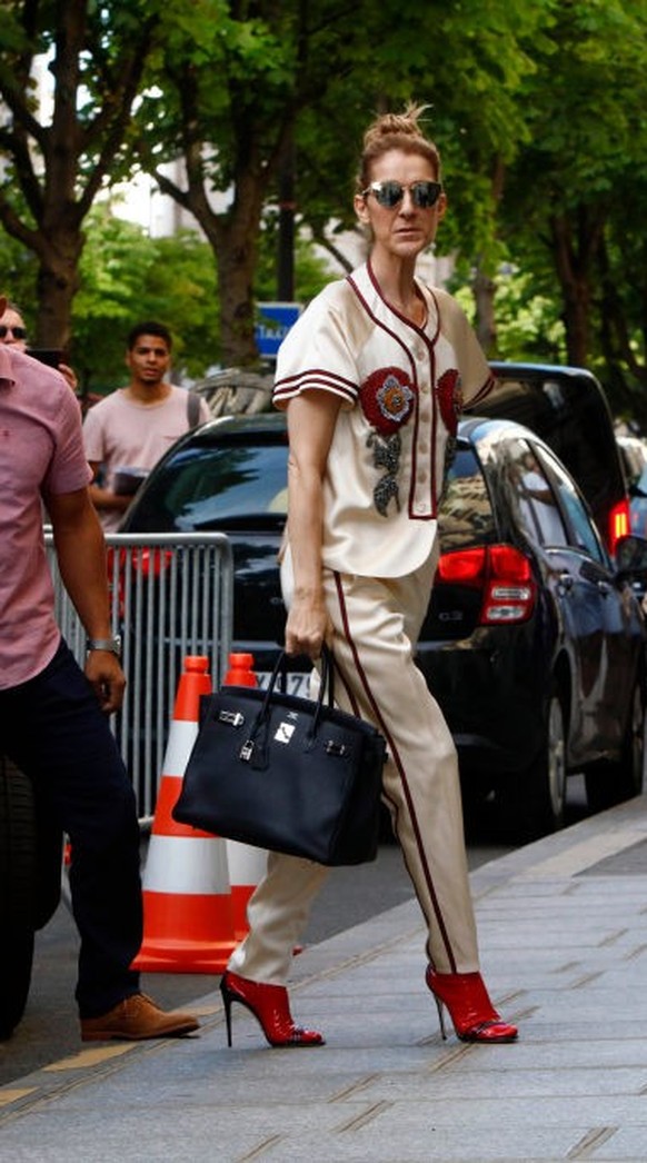 Celine Dion out with her child visit a shop in Paris, France, on July 17, 2017. Celine Dion is a Canadian singer and businesswoman. (Photo by Mehdi Taamallah/NurPhoto via Getty Images)