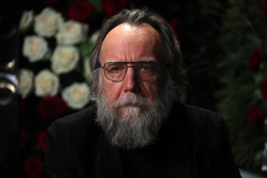 epa10134248 Russian political philosopher Alexander Dugin, leader of the International Eurasian Movement, attends a mouring ceremony for his daughter, Russian journalist and political scientist Darya  ...