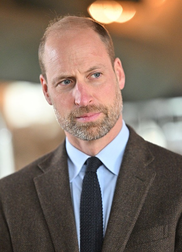 COOKSTOWN, NORTHERN IRELAND - OCTOBER 14: Prince William, Prince of Wales listens during his visit to Mallon Farm, a flax farm in County Tyrone that is spearheading the revival of flax growing for lin ...
