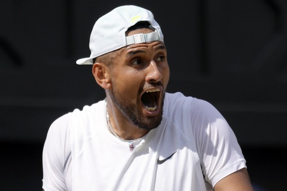 Australia&#039;s Nick Kyrgios shouts during the final of the men&#039;s singles against Serbia&#039;s Novak Djokovic on day fourteen of the Wimbledon tennis championships in London, Sunday, July 10, 2 ...