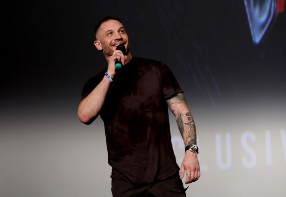 LONDON, ENGLAND - SEPTEMBER 14: Tom Hardy on stage at the fan screening of "Venom: Let There Be Carnage" at Cineworld Leicester Square on September 14, 2021 in London, England. (Photo by Tri ...