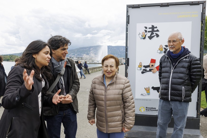 Swiss editorial cartoonist Patrick Chappatte, 2nd left, President of the Freedom Cartoonists Foundation, Laureates 2024 of the Kofi Annan Courage in Cartooning Award Rachita Taneja of India, left, and ...