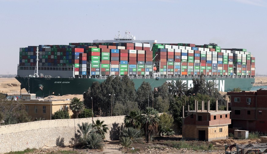 epa09104986 The container ship &#039;Ever Given&#039; is moving in the Suez Canal, Egypt, 29 March 2021. The Suez Canal Authority on 29 March said that traffic is to resume after the large container s ...
