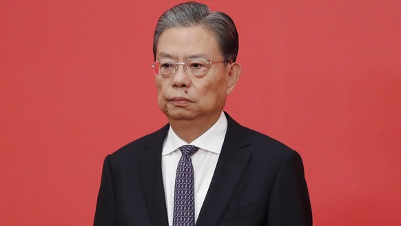 epa10260294 New member of the Standing Committee of the Political Bureau of the 20th Chinese Communist Party (CPC) Central Committee Zhao Leji looks on during a press conference at the Great Hall of P ...