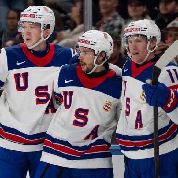 Isaac Howard (au centre) a inscrit un doublé pour les Etats-Unis.