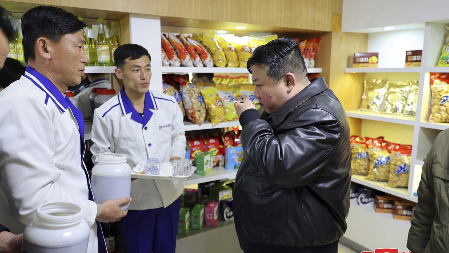 In this photo provided by the North Korean government, North Korean leader Kim Jong Un inspects an industrial factory in Kimhwa county, North Korea, Wednesday, Feb. 7, 2024. Independent journalists we ...