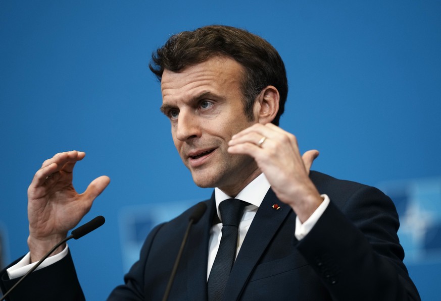 FILE- French President Emmanuel Macron speaks during a media conference, after an extraordinary NATO summit and Group of Seven meeting, at NATO headquarters in Brussels, Thursday, March 24, 2022. Fran ...