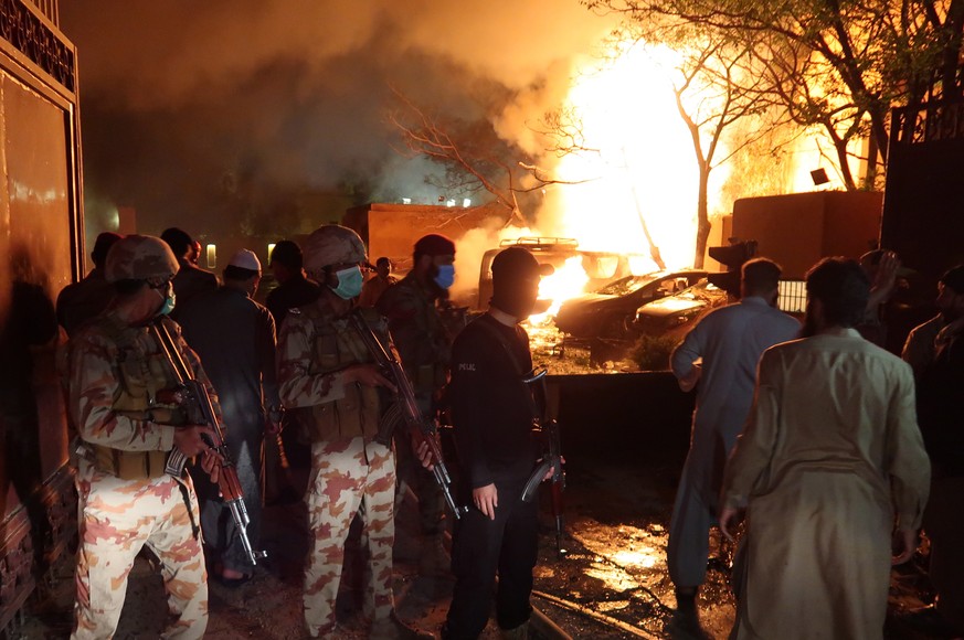 epa09151129 Flames rise from inside the Serena hotel after a bomb blast in Quetta, provincial capital of Balochistan province, Pakistan, 21 April 2021. A bomb exploded at a parking lot of Serena hotel ...