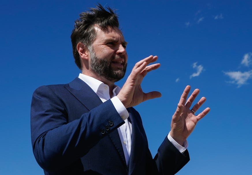 Vice President JD Vance speaks to reporters at Joint Base Andrews, Md., Saturday, June 20, 2026, en route to Switzerland. (Elizabeth Frantz/Pool Photo via AP)
Vance