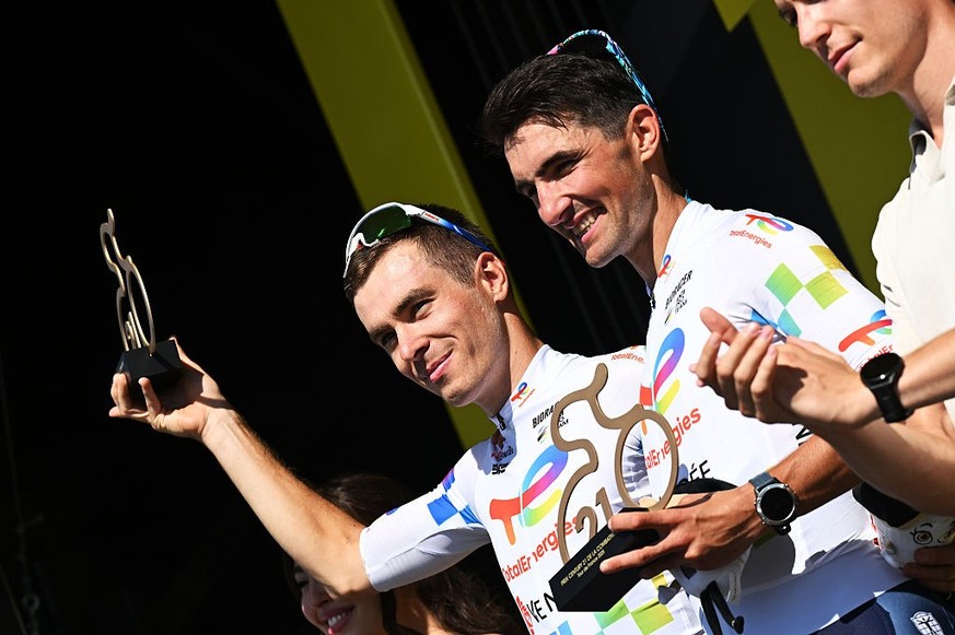 LAVAL, FRANCE - JULY 12: (L-R) Matteo Vercher of France and Mathieu Burgaudeau of France and Team TotalEnergies celebrate at podium as most combative riders prize winners during the 112th Tour de Fran ...