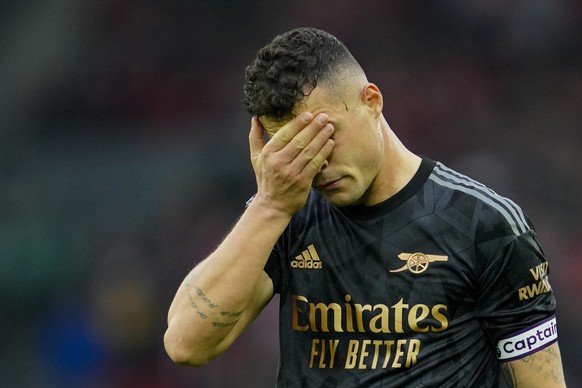Arsenal&#039;s Granit Xhaka reacts at the end of the English Premier League soccer match between Liverpool and Arsenal at Anfield in Liverpool, England, Sunday, April 9, 2023. (AP Photo/Jon Super)
