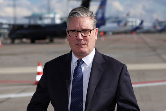 British Prime Minister Keir Starmer makes a statement about a stabbing incident in Manchester, England, after he left the European Political Community summit, at Copenhagen Airport, in Kastrup, Denmar ...
