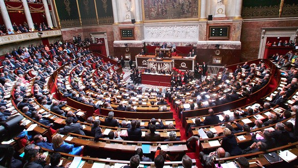 French lawmakers listen to the speech of Prime Minister Dominique de Villepin at the National Assembly in Paris, Wednesday, June 8, 2005. Villepin spelled out his plan to defeat double-digit unemploym ...
